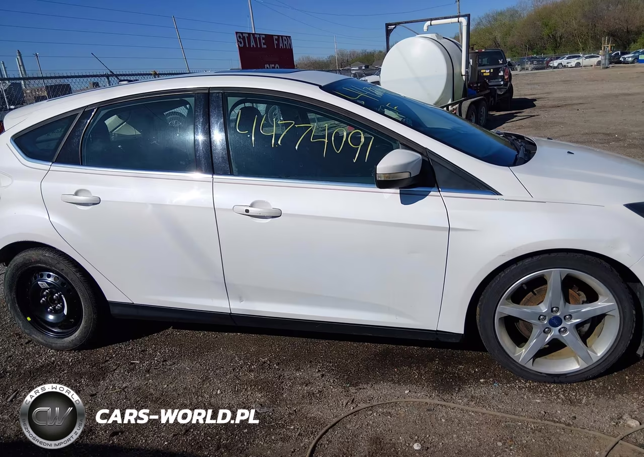 2013 Ford Focus Titanium VIN:1FADP3N21DL245201 - 14