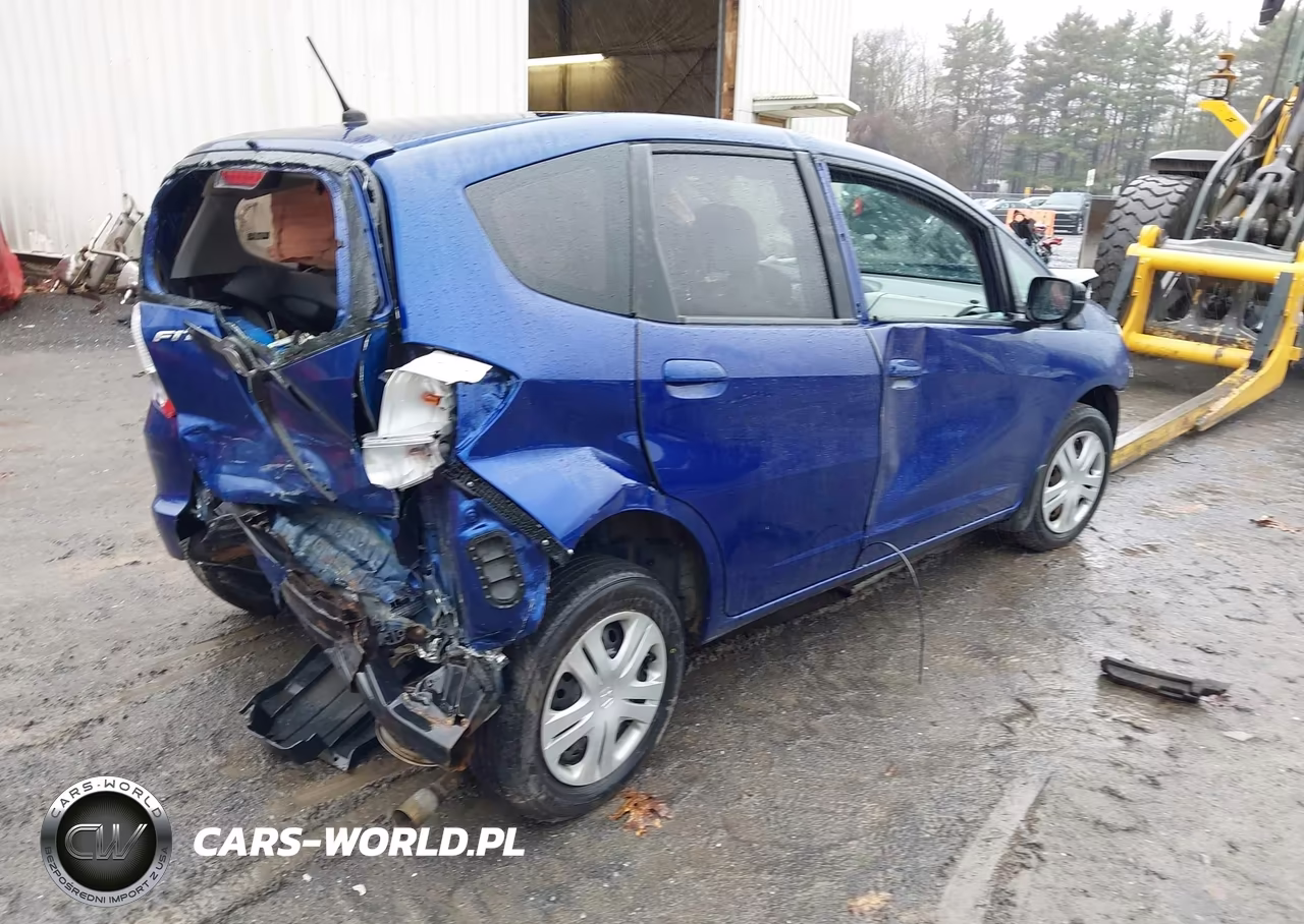 2009 Honda Fit VIN:JHMGE88219S003123 - 4