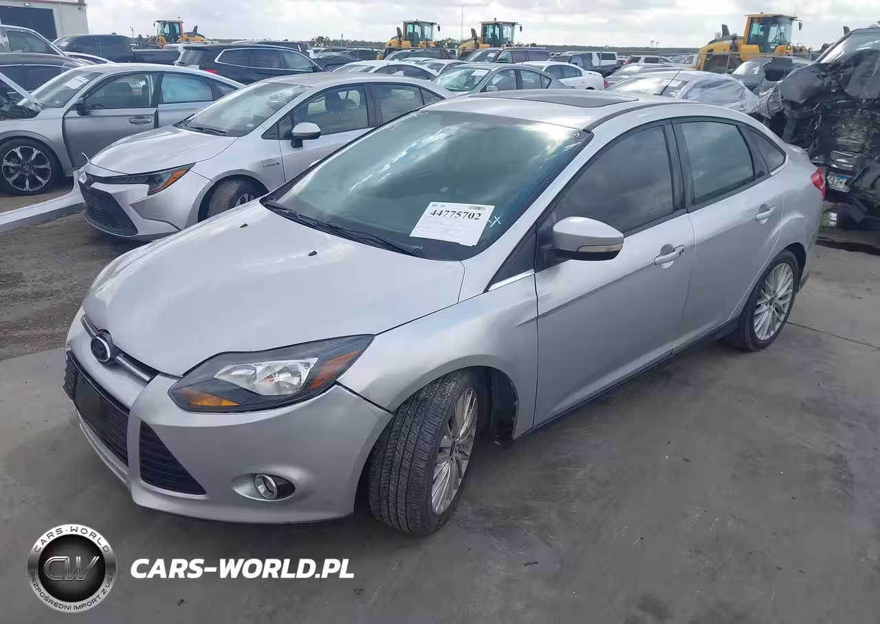 2014 Ford Focus Titanium VIN:1FADP3J23EL463325 - 2