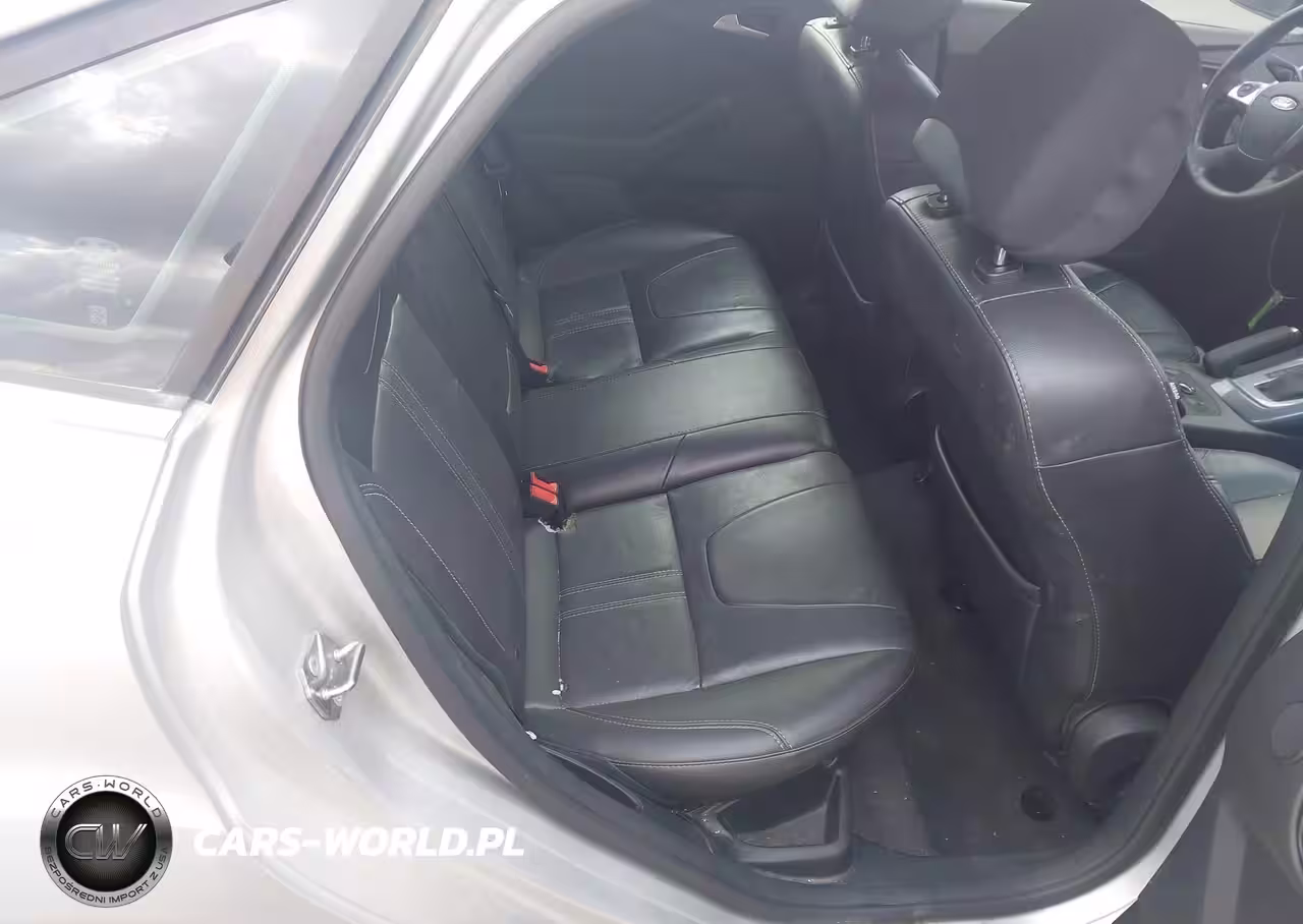 2014 Ford Focus Titanium VIN:1FADP3J23EL463325 - 8