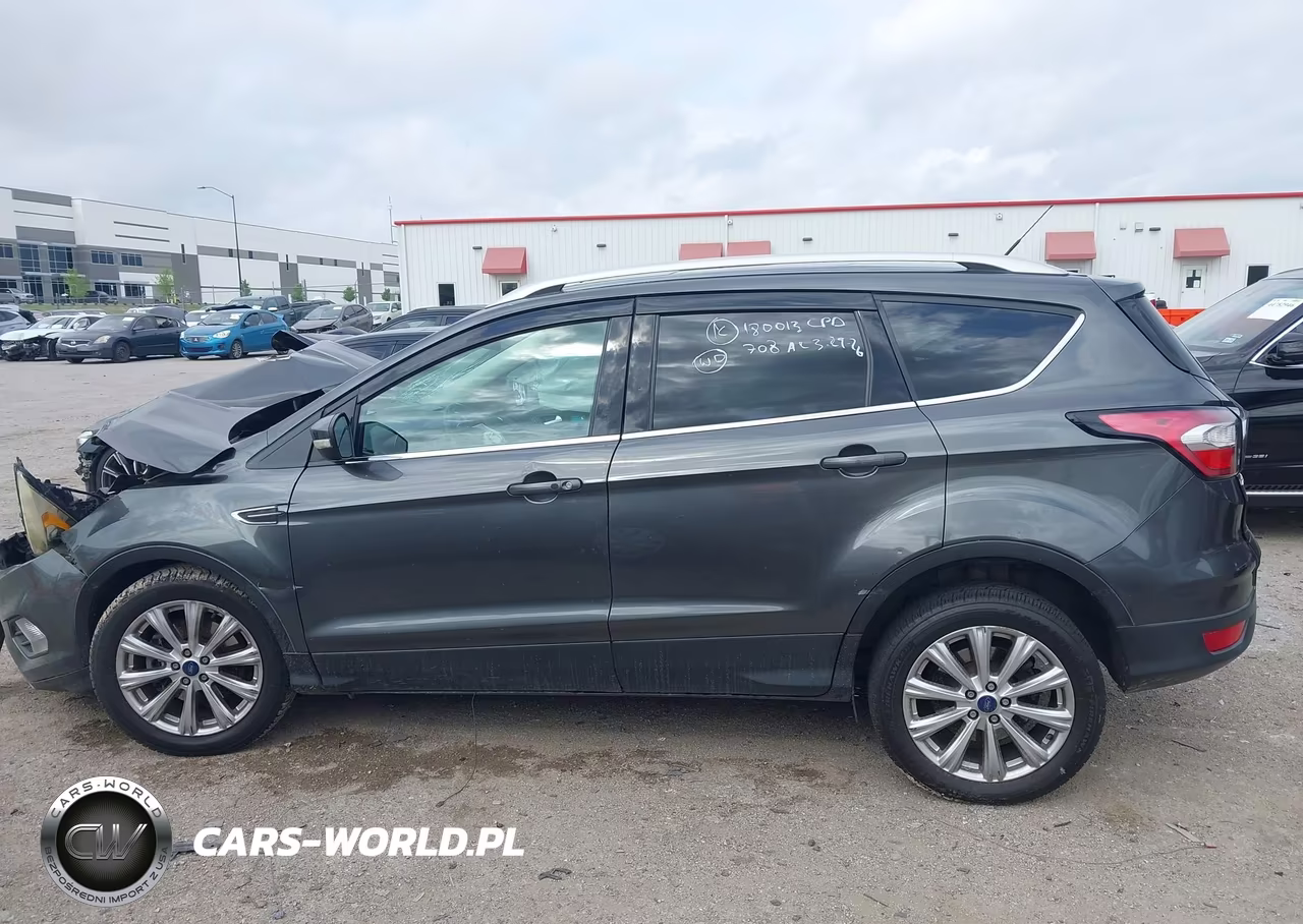 2017 Ford Escape Titanium VIN:1FMCU0J97HUF05841 - 14