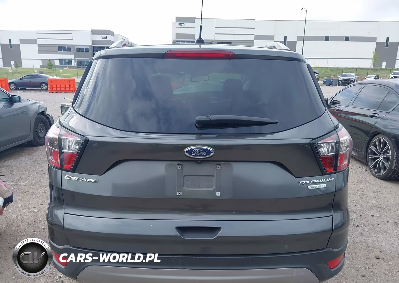 2017 Ford Escape Titanium VIN:1FMCU0J97HUF05841 - 16