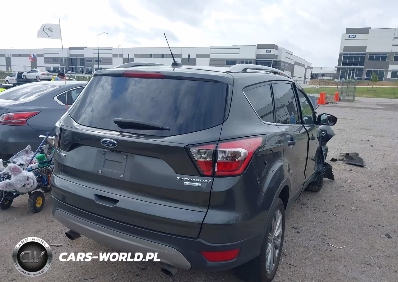 2017 Ford Escape Titanium VIN:1FMCU0J97HUF05841 - 4