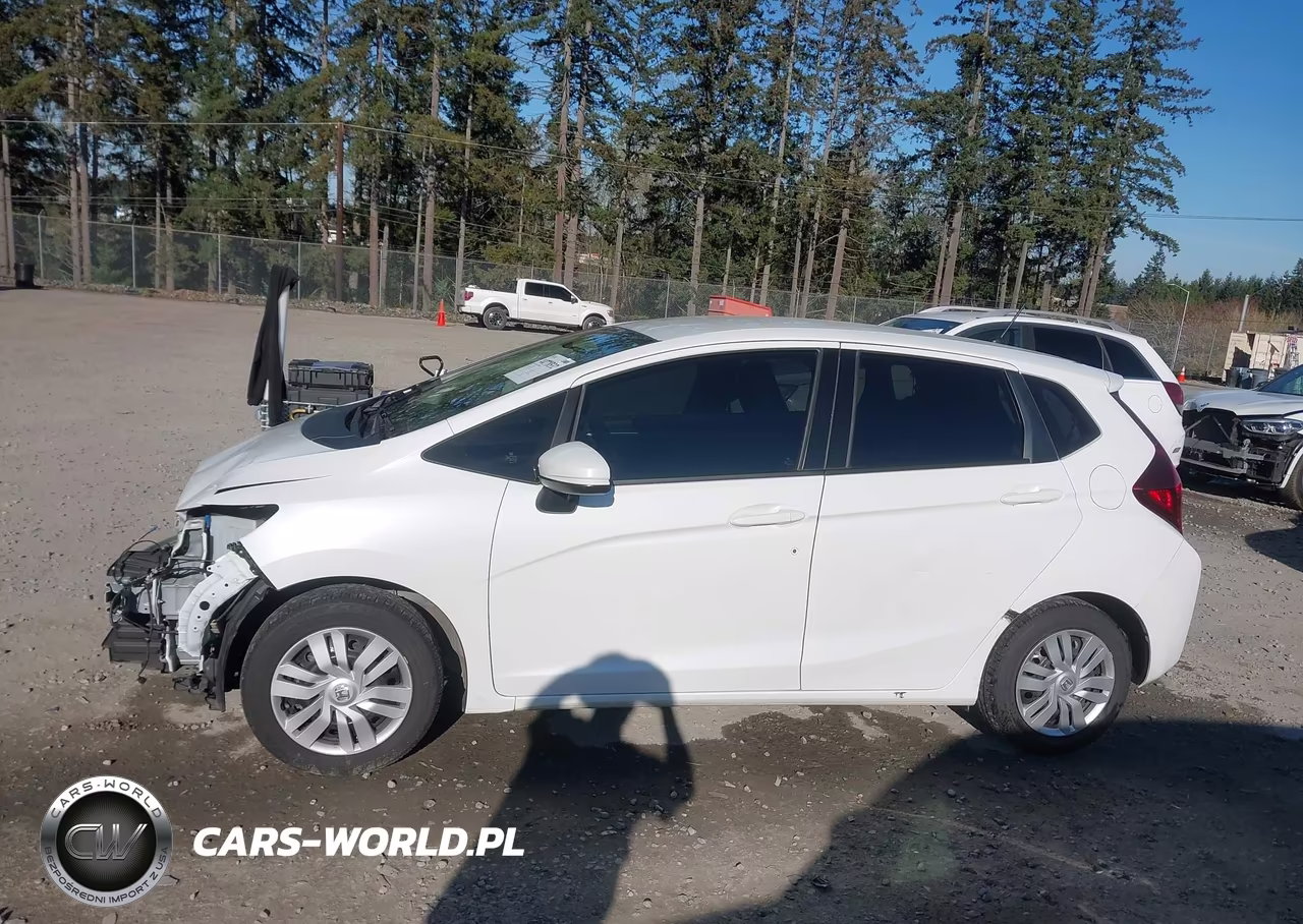2016 Honda Fit Lx VIN:JHMGK5H51GX037676 - 14