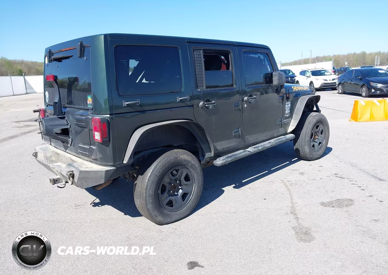 2011 Jeep Wrangler Unlimited Sahara VIN:1J4BA5H13BL618053 - 4