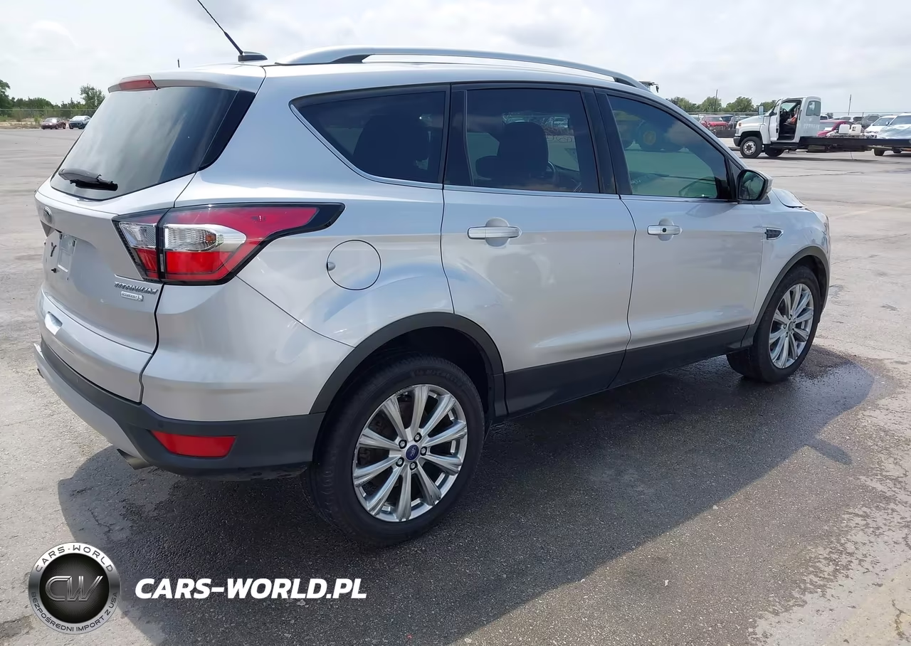 2017 Ford Escape Titanium VIN:1FMCU0JD0HUE46801 - 4