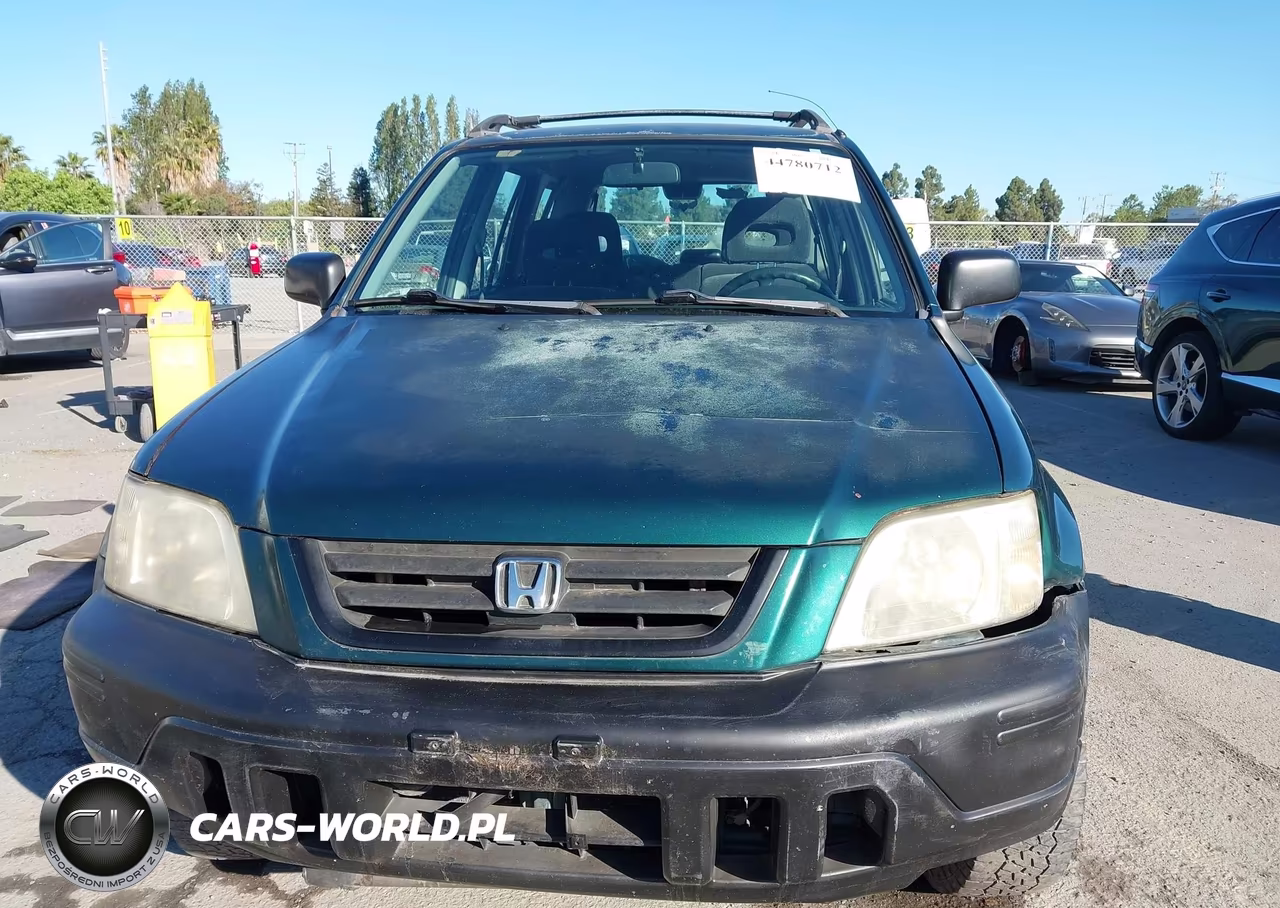 1999 Honda Cr-V Lx VIN:JHLRD1842XC074539 - 12