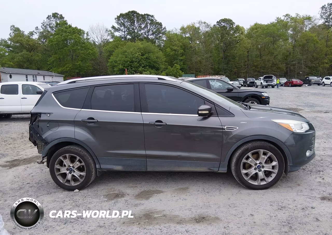 2015 Ford Escape Titanium VIN:1FMCU0J97FUC10770 - 14