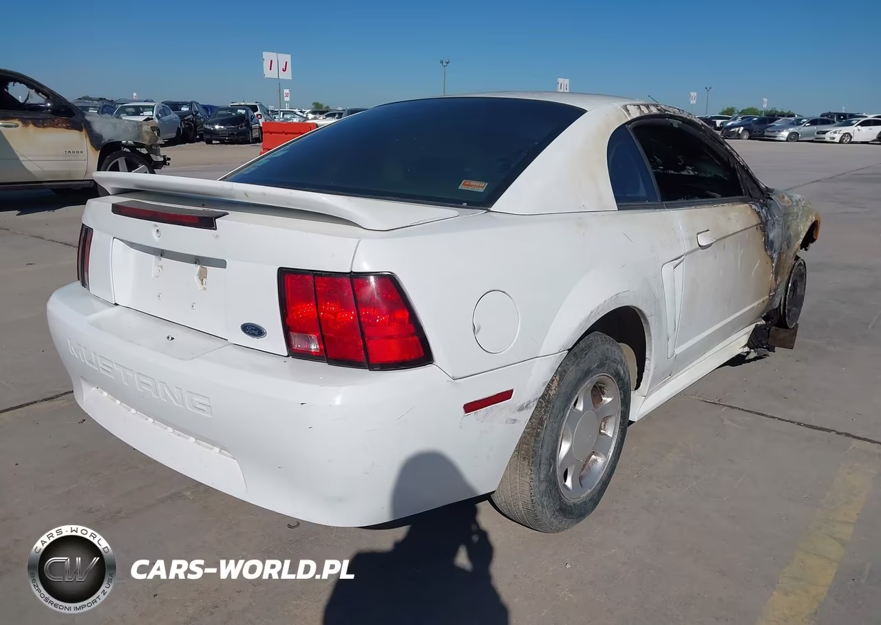 1999 Ford Mustang VIN:1FAFP4042XF101280 - 4