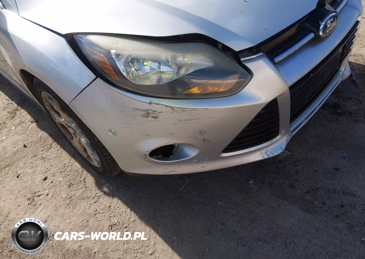 2012 Ford Focus Titanium VIN:1FAHP3J2XCL102169 - 13