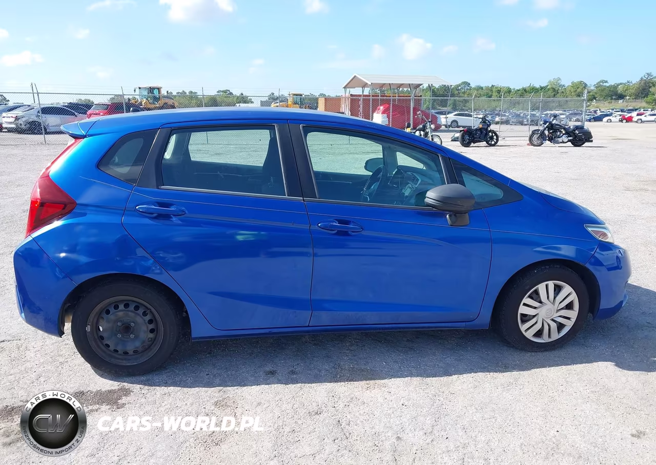 2015 Honda Fit Lx VIN:3HGGK5H5XFM768291 - 13