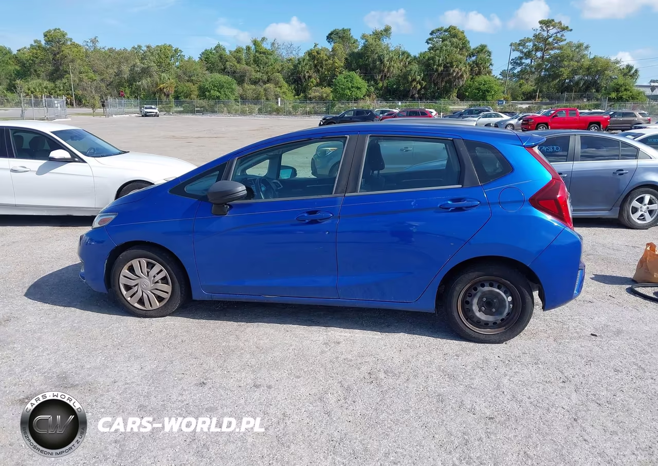 2015 Honda Fit Lx VIN:3HGGK5H5XFM768291 - 14