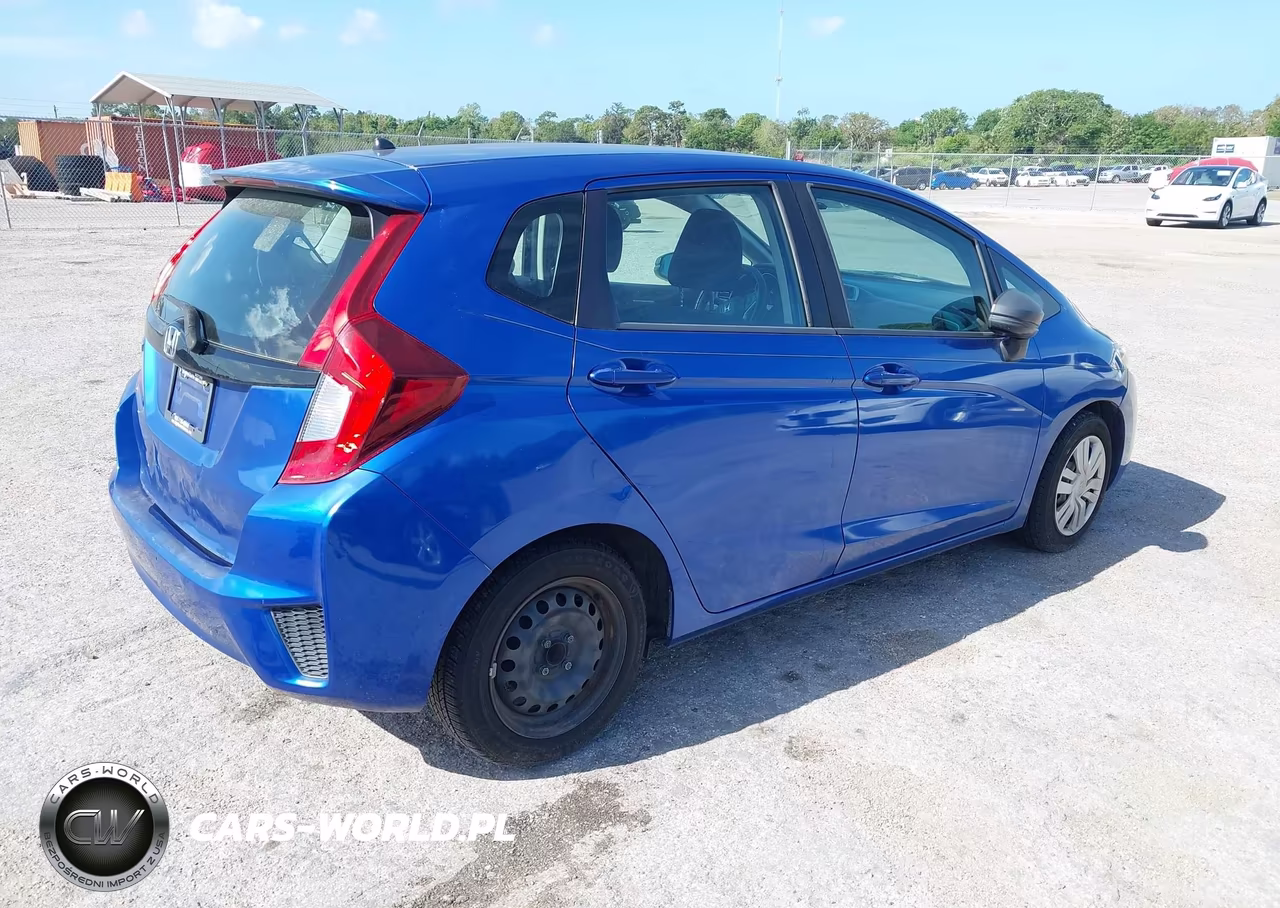 2015 Honda Fit Lx VIN:3HGGK5H5XFM768291 - 4