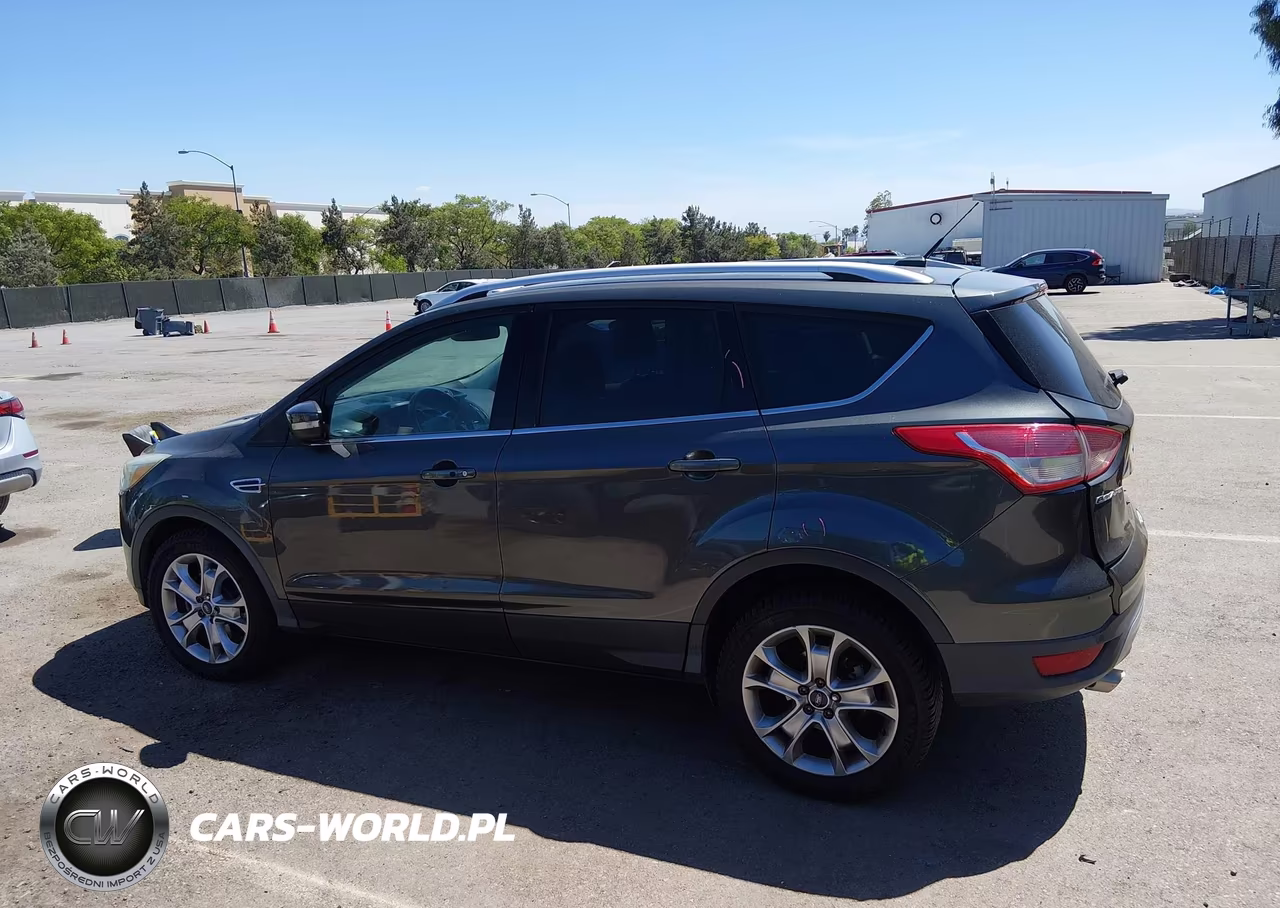 2016 Ford Escape Titanium VIN:1FMCU9JX0GUC72497 - 14