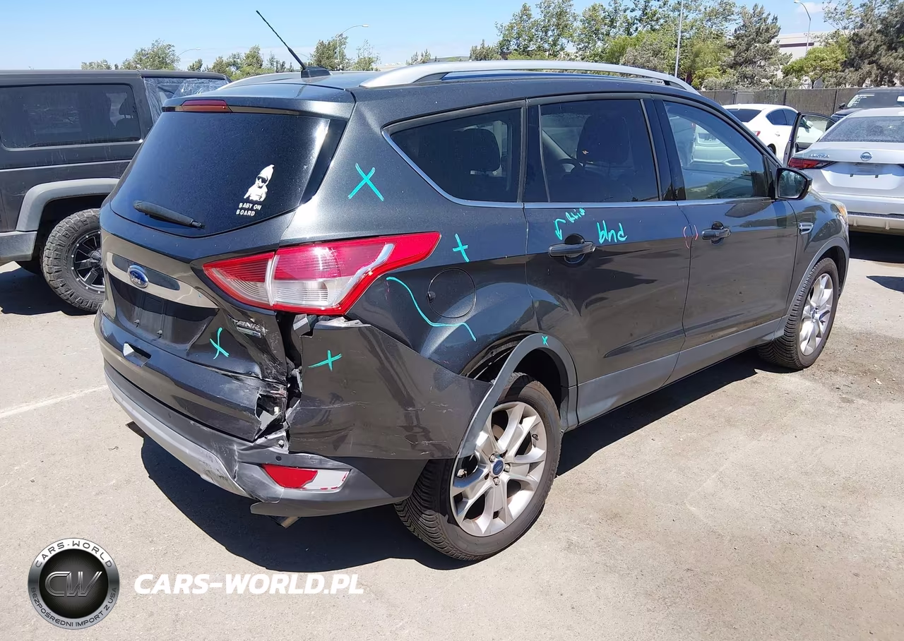 2016 Ford Escape Titanium VIN:1FMCU9JX0GUC72497 - 4