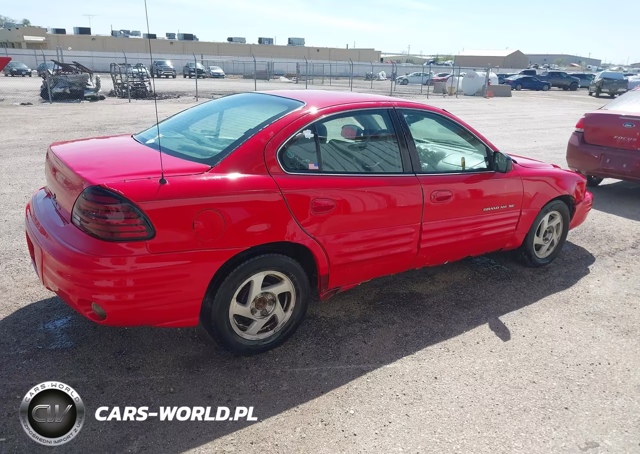 1999 Pontiac Grand Am Se1 VIN:1G2NE52E9XC502399 - 4
