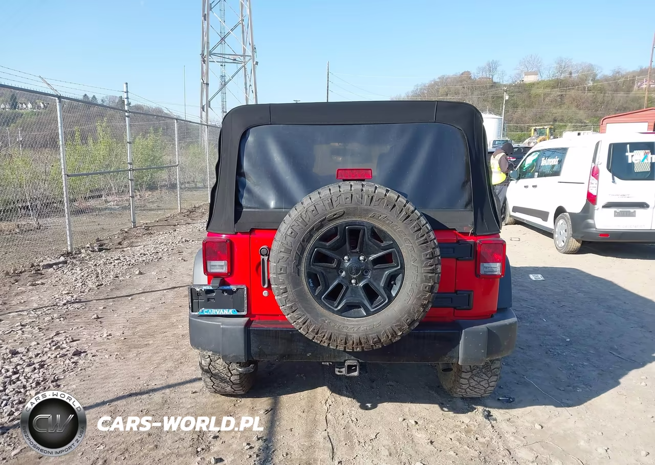 2015 Jeep Wrangler Unlimited Willys Wheeler VIN:1C4BJWDG7FL670717 - 17