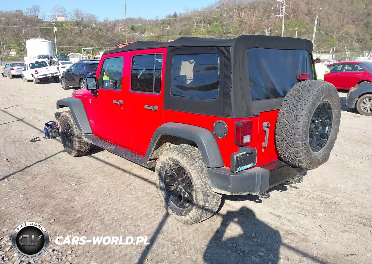 2015 Jeep Wrangler Unlimited Willys Wheeler VIN:1C4BJWDG7FL670717 - 3