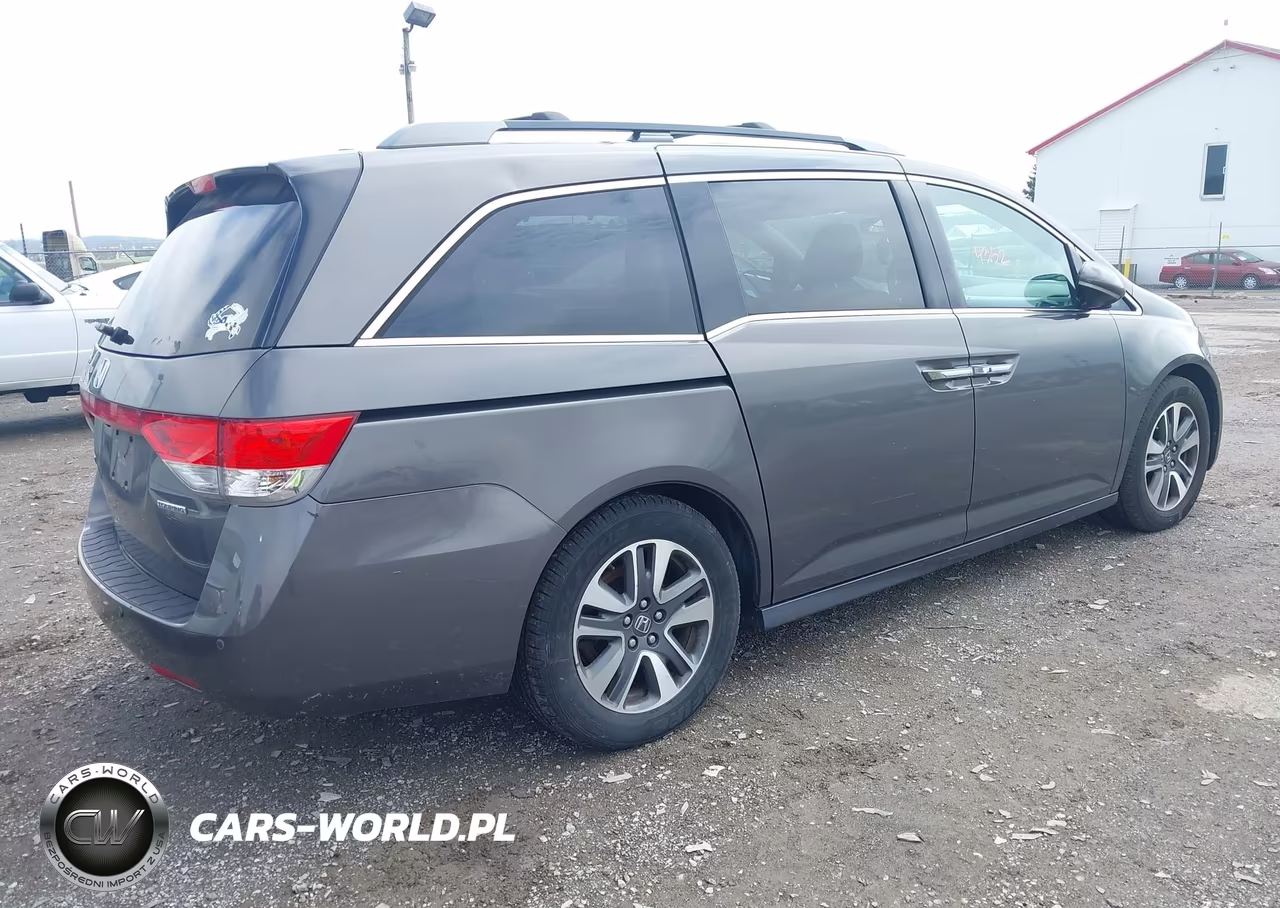 2014 Honda Odyssey Touring-Touring Elite VIN:5FNRL5H92EB023660 - 4