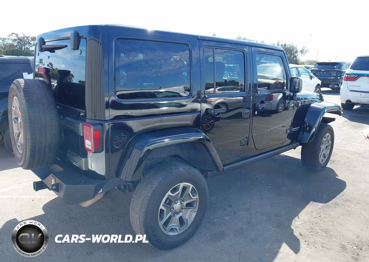 2015 Jeep Wrangler Unlimited Rubicon VIN:1C4BJWFG5FL538116 - 4