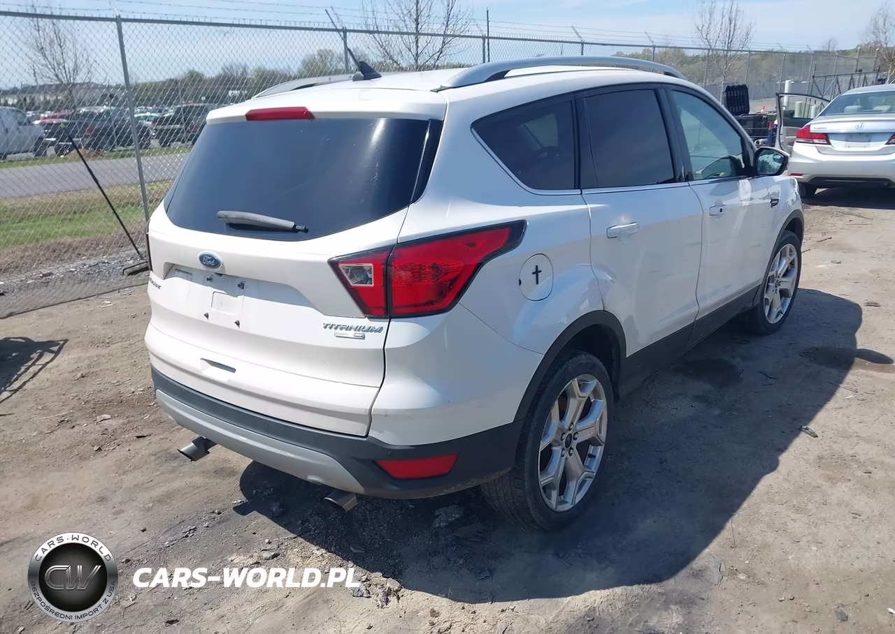 2019 Ford Escape Titanium VIN:1FMCU9J98KUC30475 - 4