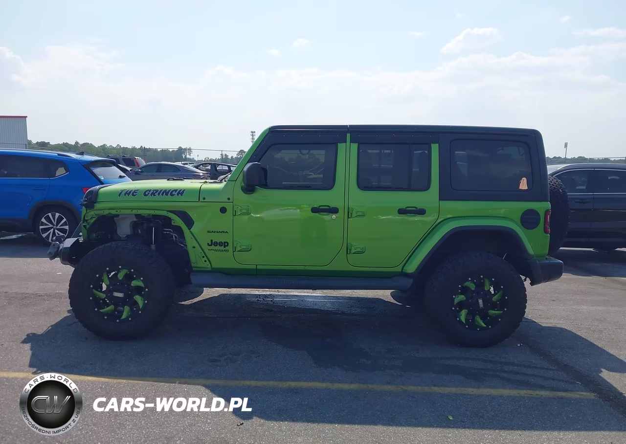 2019 Jeep Wrangler Unlimited Sahara 4X4 VIN:1C4HJXEN0KW594781 - 14