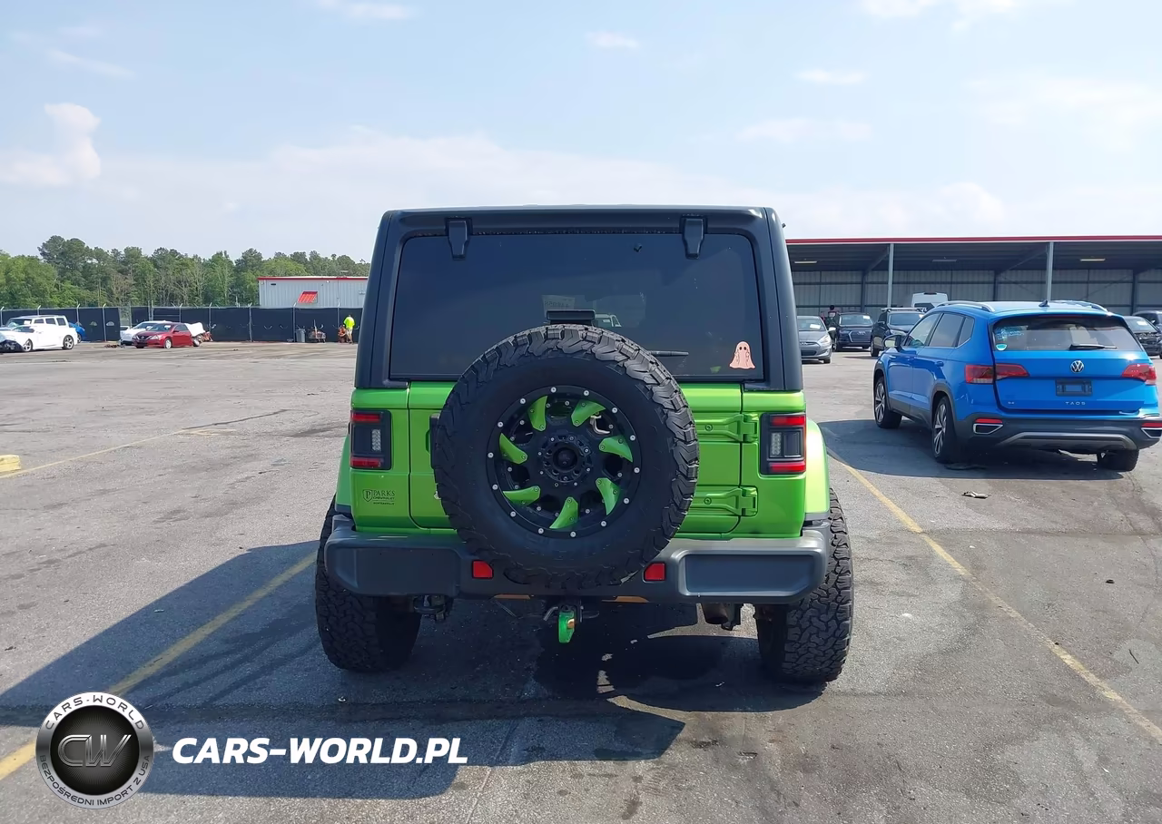2019 Jeep Wrangler Unlimited Sahara 4X4 VIN:1C4HJXEN0KW594781 - 16
