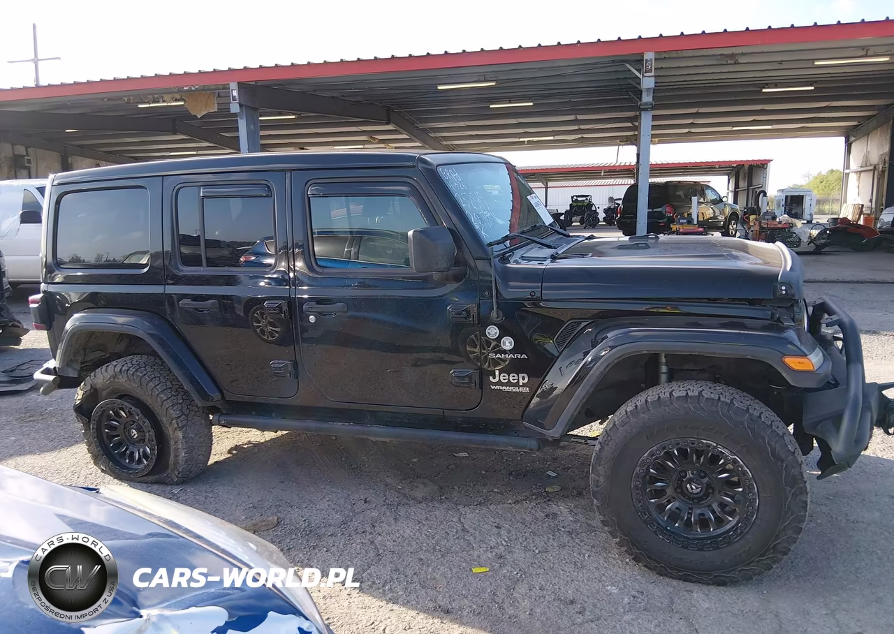 2020 Jeep Wrangler Unlimited Sahara 4X4 VIN:1C4HJXEG9LW252569 - 13