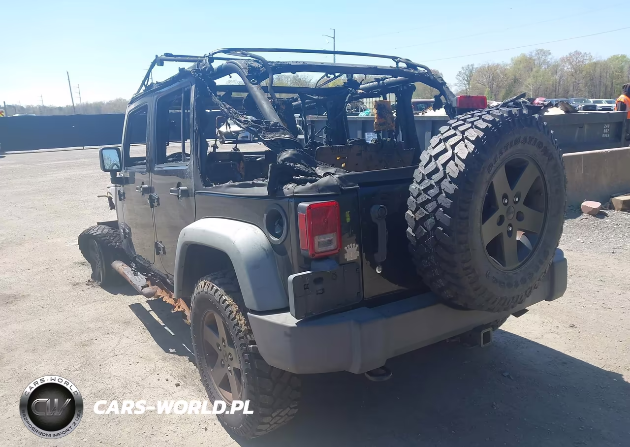 2012 Jeep Wrangler Unlimited Sport VIN:1C4BJWDG4CL102887 - 3