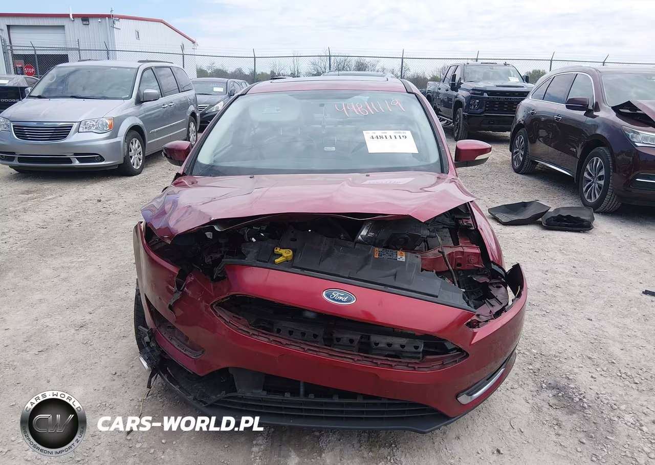2015 Ford Focus Titanium VIN:1FADP3J28FL323157 - 12