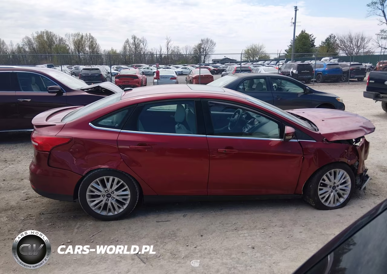 2015 Ford Focus Titanium VIN:1FADP3J28FL323157 - 13