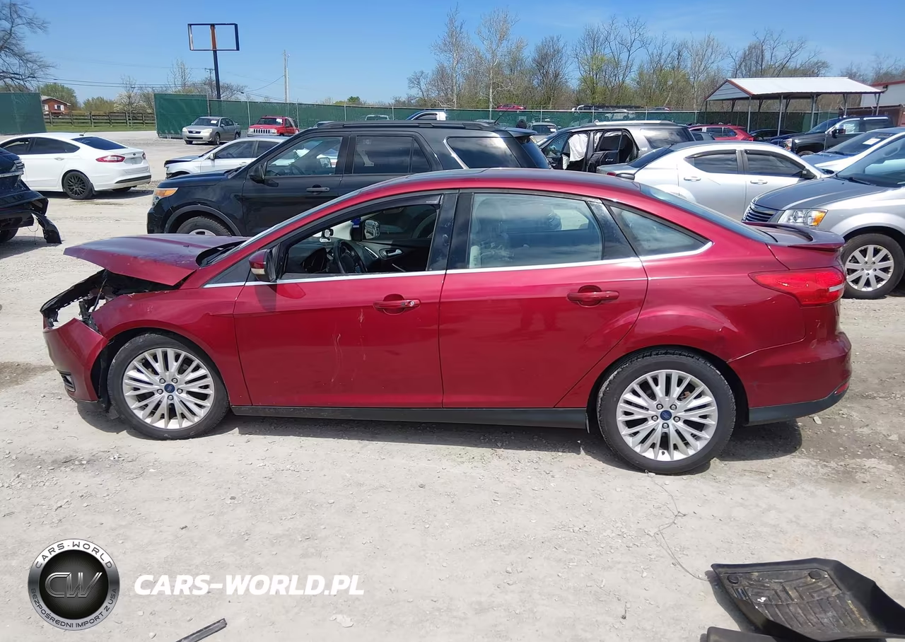 2015 Ford Focus Titanium VIN:1FADP3J28FL323157 - 14