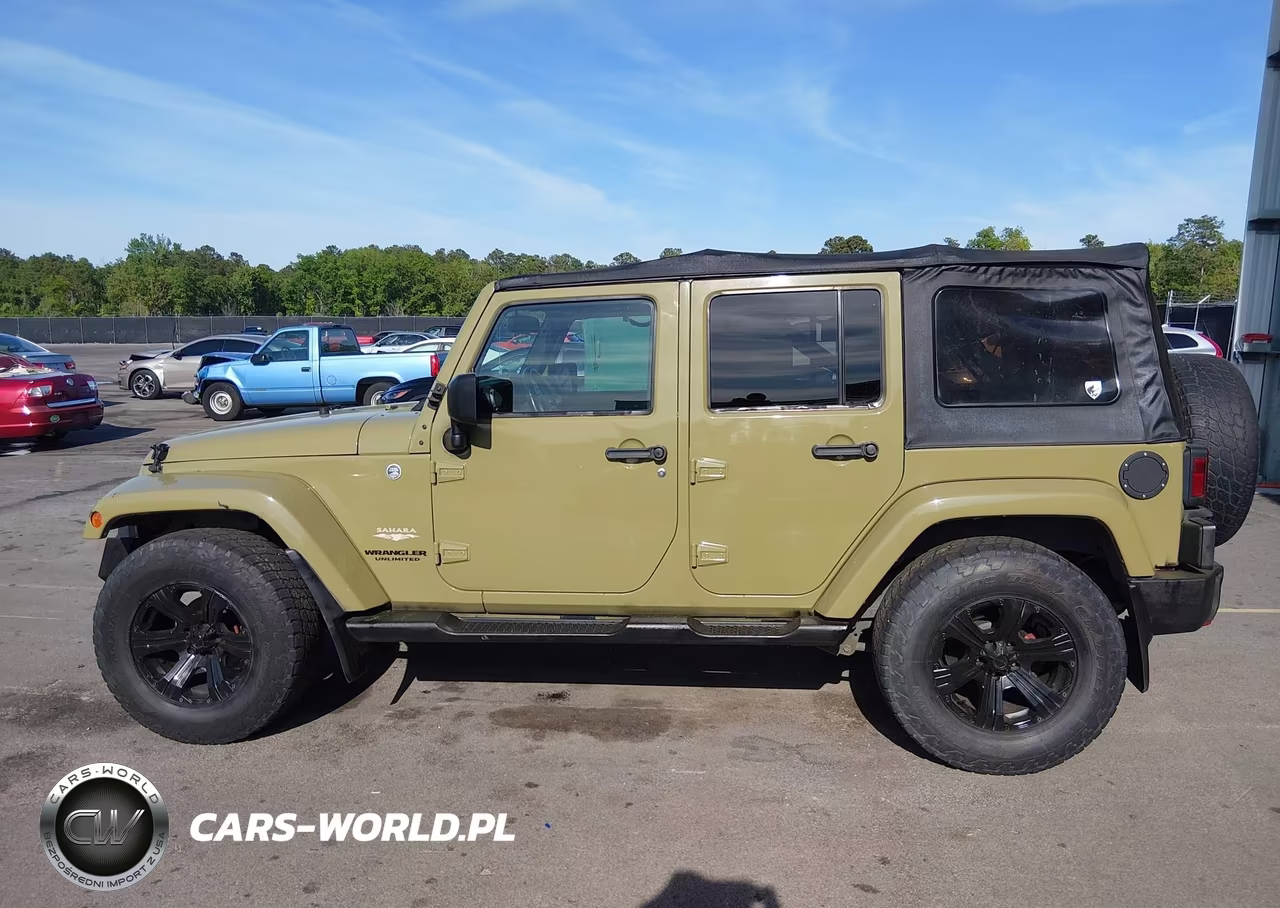 2013 Jeep Wrangler Unlimited Sahara VIN:1C4HJWEG7DL609034 - 14