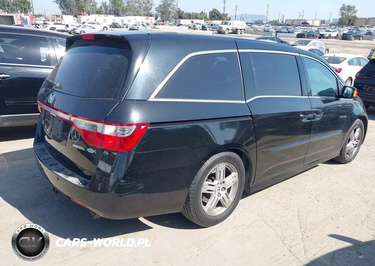 2011 Honda Odyssey Touring-Touring Elite VIN:5FNRL5H91BB091556 - 4
