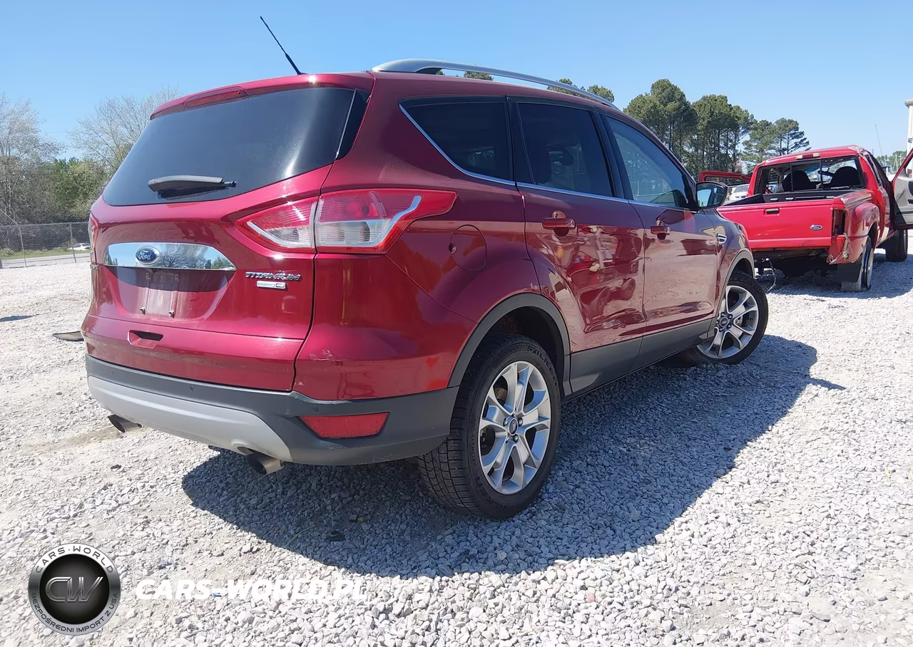2016 Ford Escape Titanium VIN:1FMCU9J92GUB98467 - 4