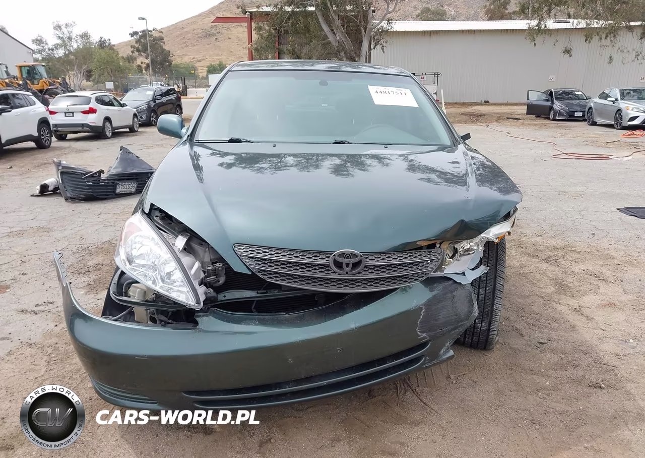 2002 Toyota Camry Le VIN:JTDBE32K520113598 - 12