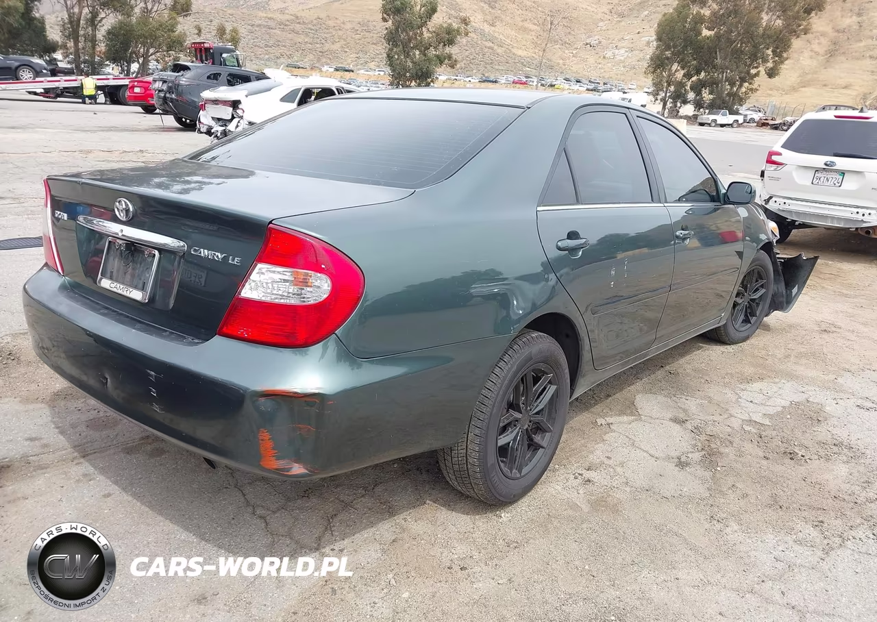 2002 Toyota Camry Le VIN:JTDBE32K520113598 - 4