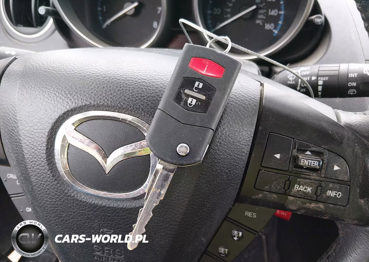 2012 Mazda Mazda3 I Touring VIN:JM1BL1L75C1670981 - 11