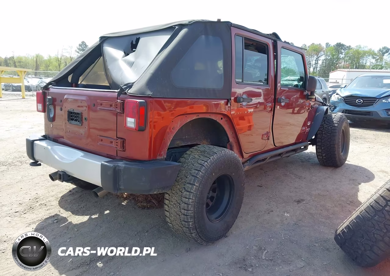 2010 Jeep Wrangler Unlimited Sahara VIN:1J4BA5H10AL102439 - 4