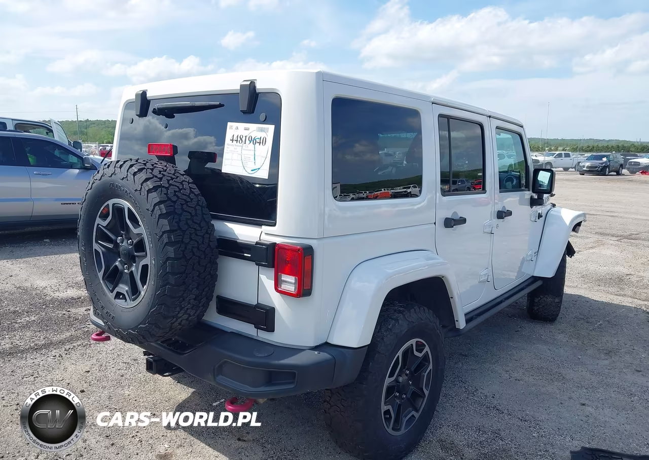 2015 Jeep Wrangler Unlimited Rubicon Hard Rock VIN:1C4HJWFG3FL670558 - 4
