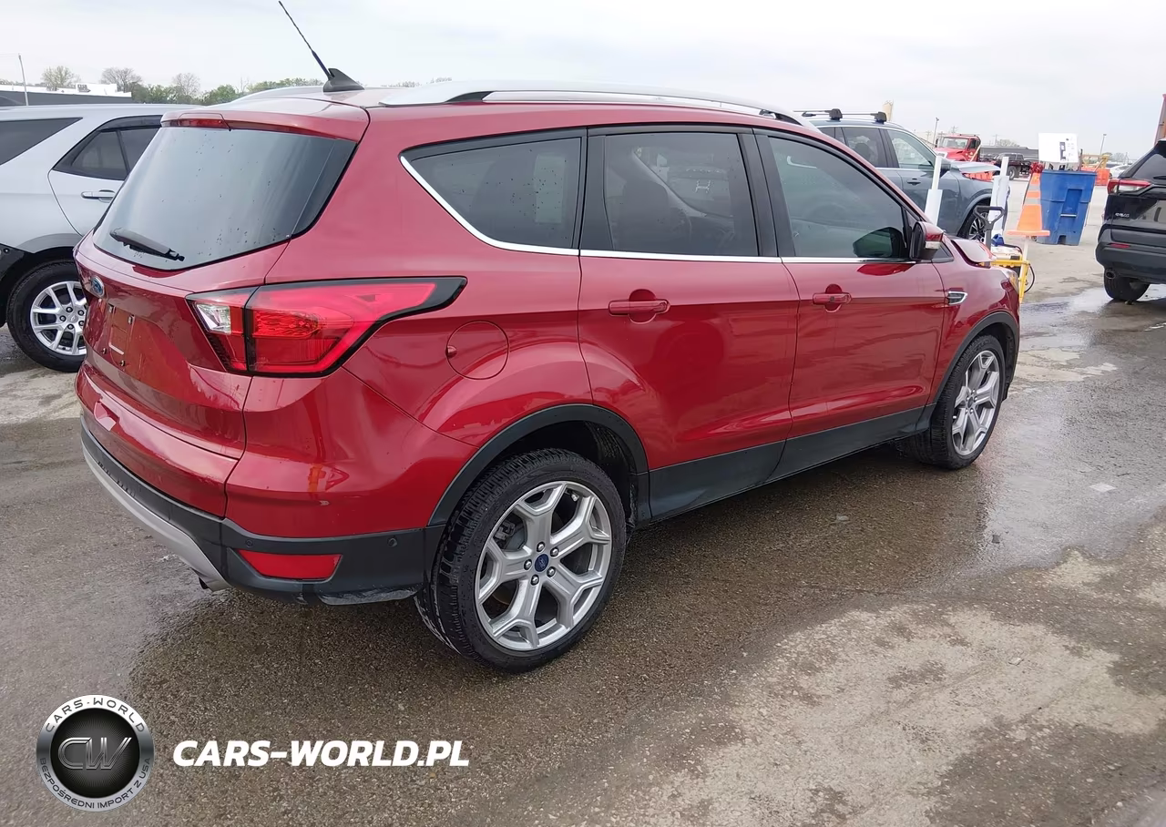 2019 Ford Escape Titanium VIN:1FMCU0J94KUB20731 - 4