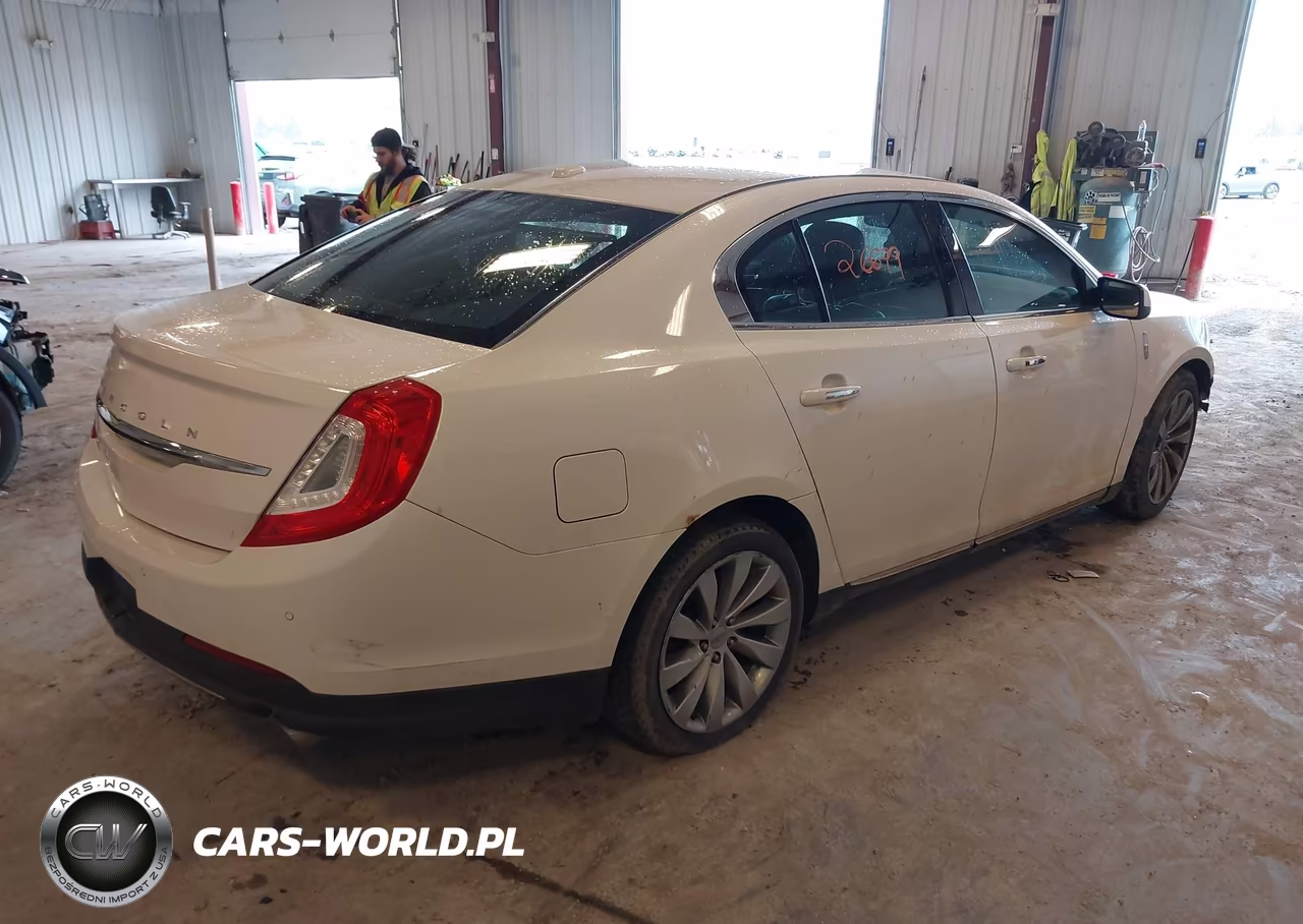 2015 Lincoln Mks VIN:1LNHL9EK5FG606334 - 4