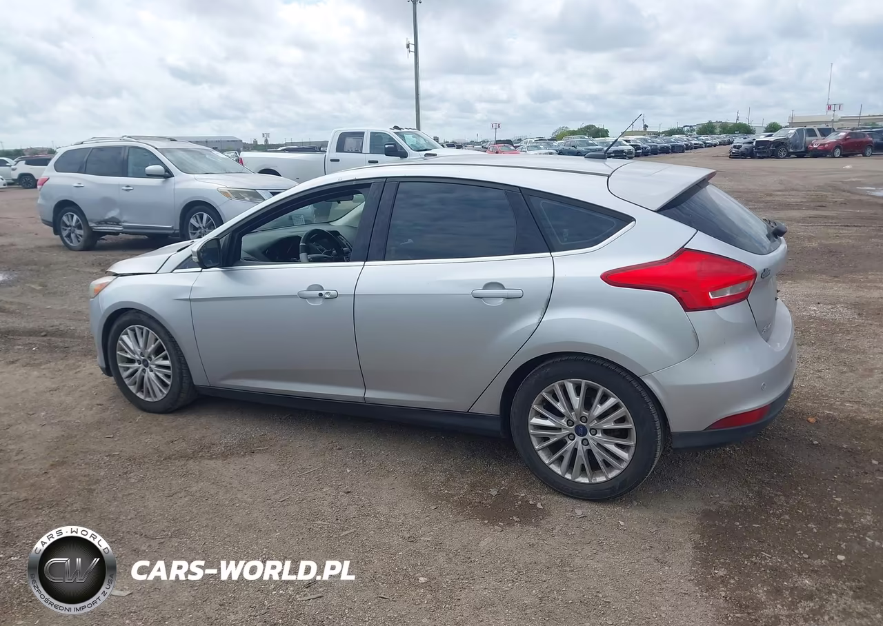 2017 Ford Focus Titanium VIN:1FADP3N24HL268526 - 14