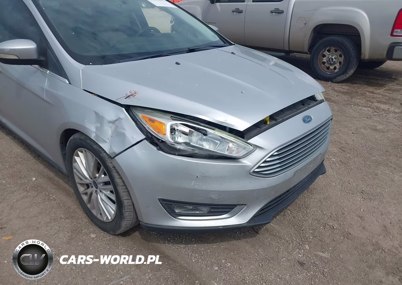 2017 Ford Focus Titanium VIN:1FADP3N24HL268526 - 6