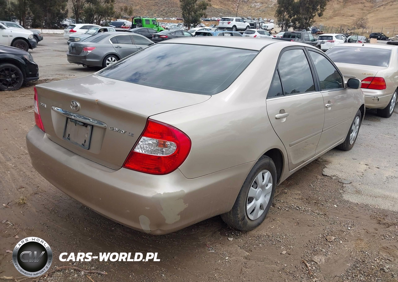 2003 Toyota Camry Le VIN:JTDBE32K930206299 - 4