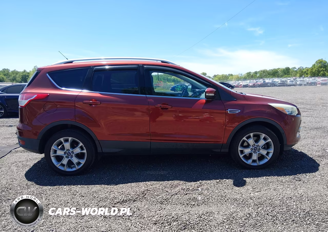 2016 Ford Escape Titanium VIN:1FMCU9J91GUA51024 - 14
