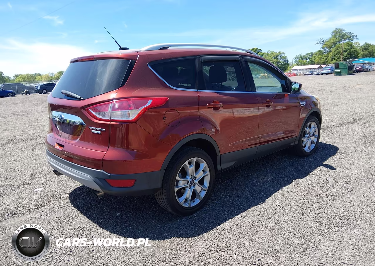 2016 Ford Escape Titanium VIN:1FMCU9J91GUA51024 - 4