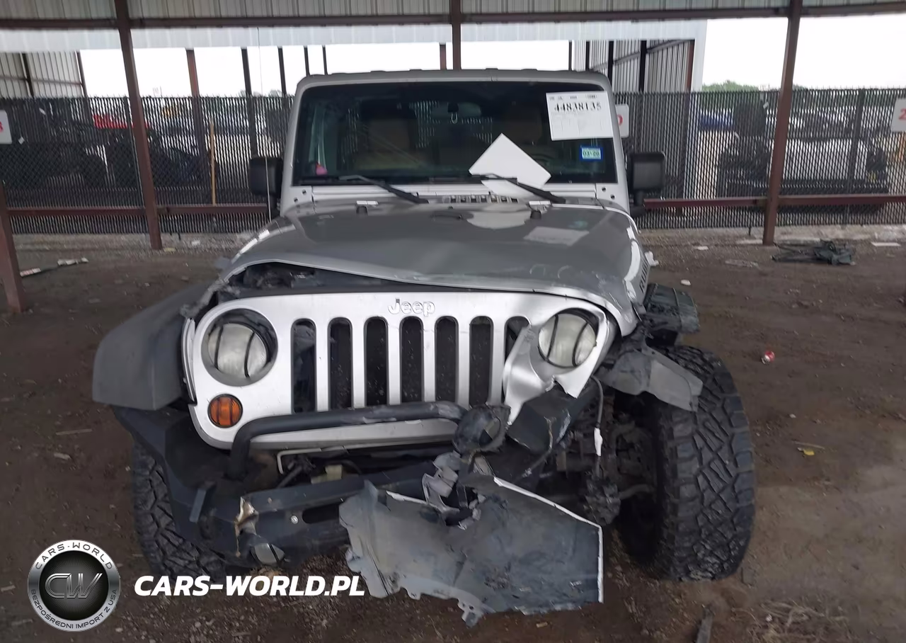 2011 Jeep Wrangler Unlimited Rubicon VIN:1J4HA6H18BL616024 - 12
