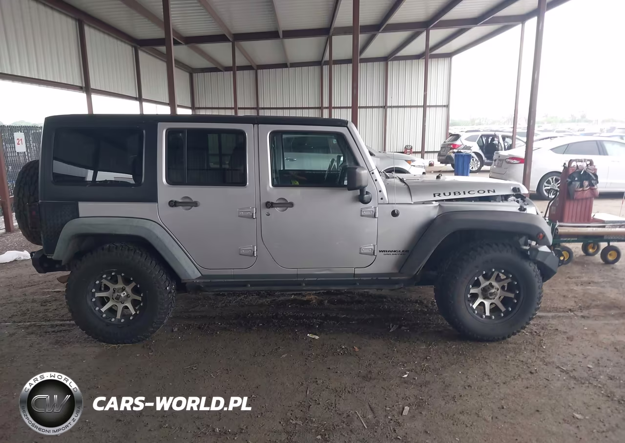 2011 Jeep Wrangler Unlimited Rubicon VIN:1J4HA6H18BL616024 - 13