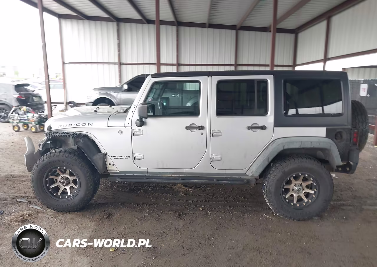 2011 Jeep Wrangler Unlimited Rubicon VIN:1J4HA6H18BL616024 - 14